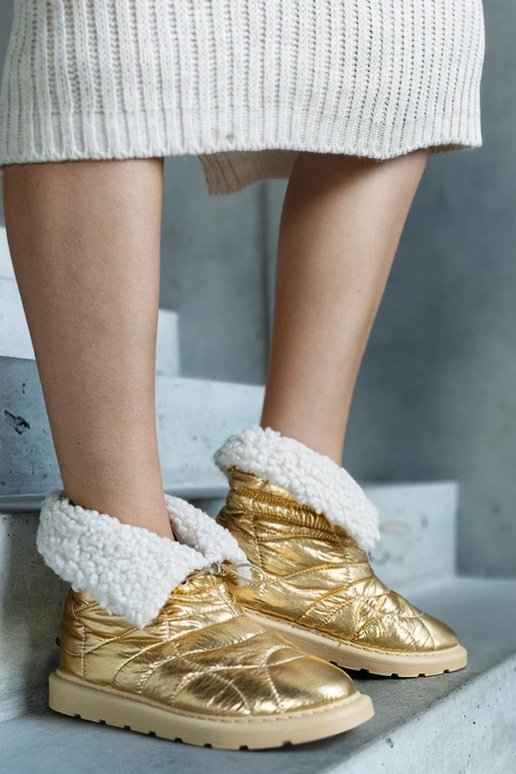 Goldene gefütterte Schneestiefel mit...