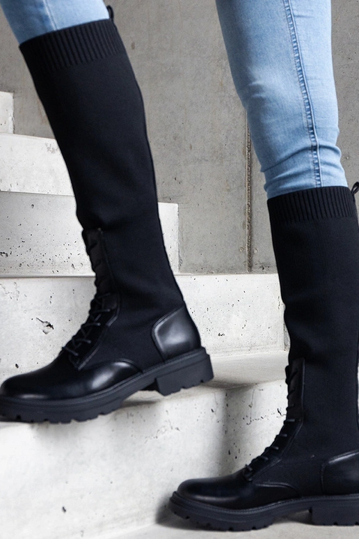 Schwarze Schlupfstiefel mit flexiblem...