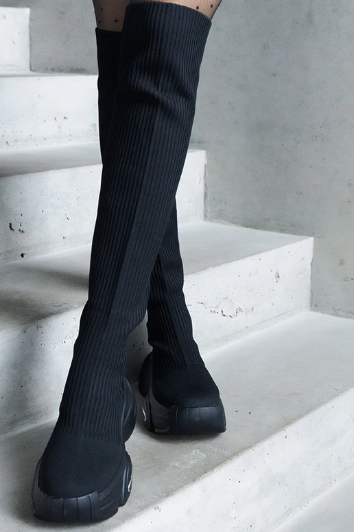 Schwarze Slip-On-Stiefel mit...