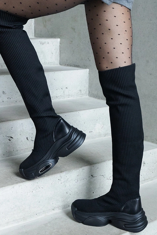 Schwarze Slip-On-Stiefel mit...