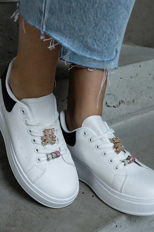 Weiße Plateau-Sneakers verziert mit... Weiße Plateau-Sneakers verziert mit...