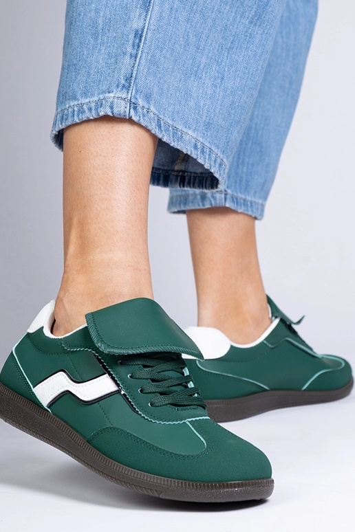 Grüne flache Damen-Sneaker mit... Grüne flache Damen-Sneaker mit...