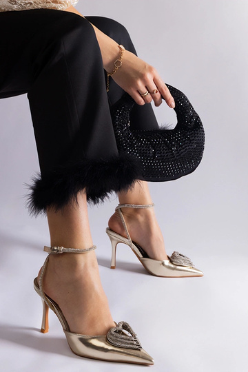 Goldene High Heels mit...