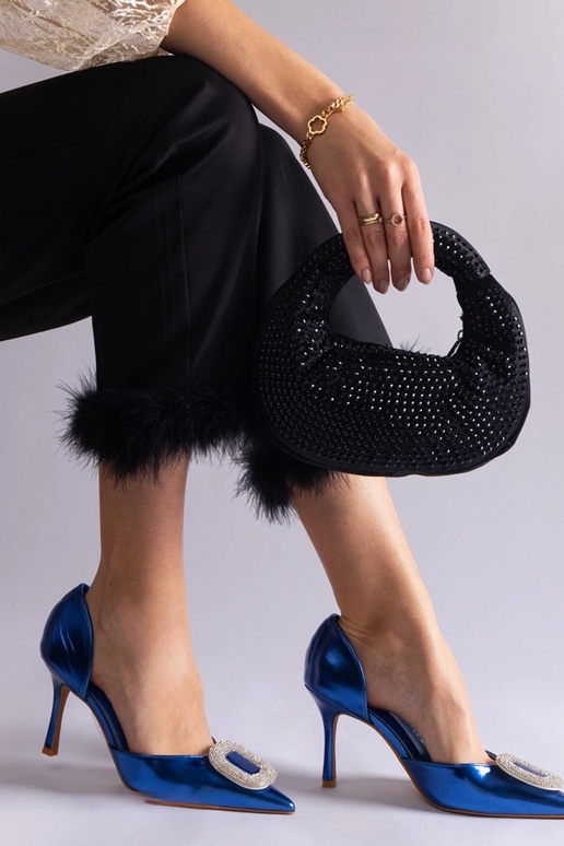 Blaue High Heels verziert mit...