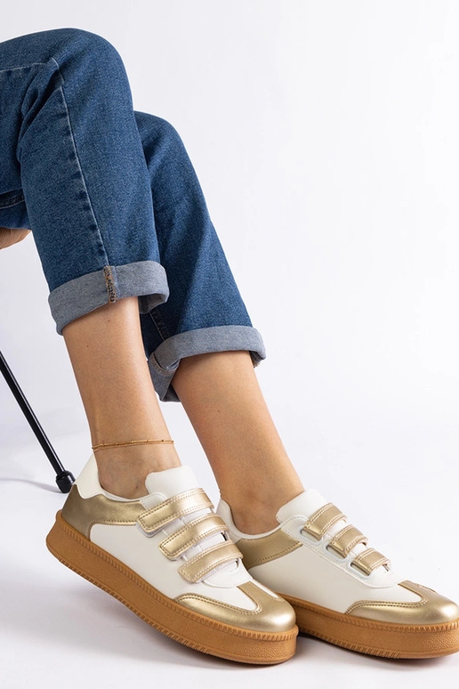 Goldene Sneakers mit Klettverschluss...