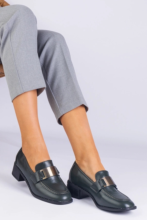 Grüne Damenschuhe mit hohen Absätzen...