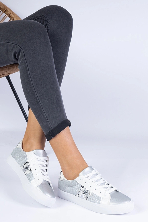 Silberne Damen-Sneaker mit Tiermotiv... Silberne Damen-Sneaker mit Tiermotiv...