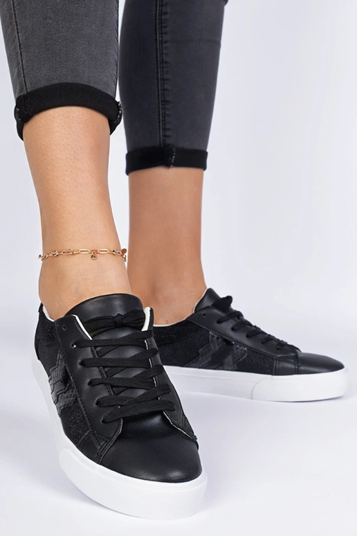 Schwarze Sneakers mit Tiermotiv und...