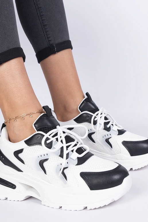 Schwarz-weiße Damen-Sport-Sneakers...