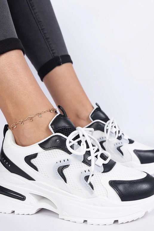 Schwarz-weiße Damen-Sport-Sneakers...