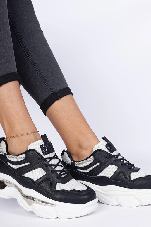 Schwarze sportliche Damen-Sneakers...