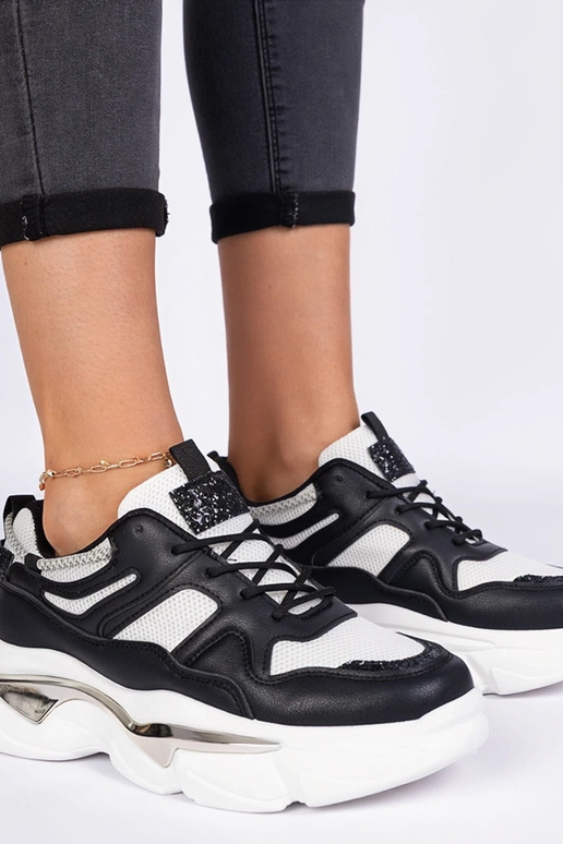 Schwarze sportliche Damen-Sneakers...