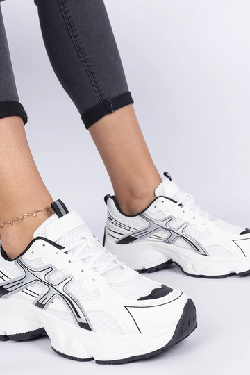 Schwarze Damensneaker auf... 2