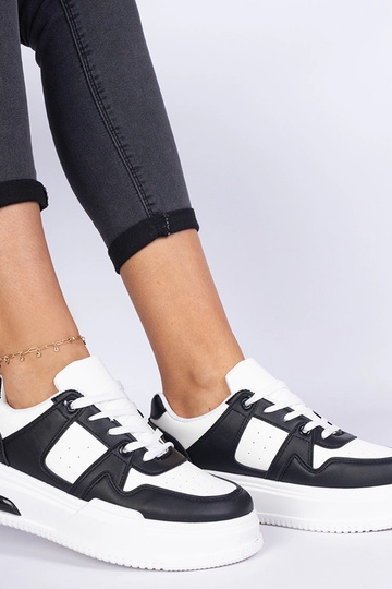 Rossio schwarz-weiße Sneakers für Damen mit dicker Sohle