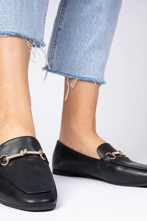 Schwarze Mokassins mit Verzierung und...
