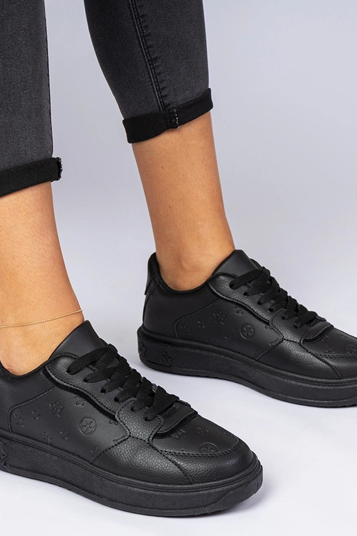 Schwarze Sportschuhe aus Kunstleder...