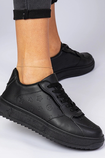 Schwarze Sportschuhe aus... 2