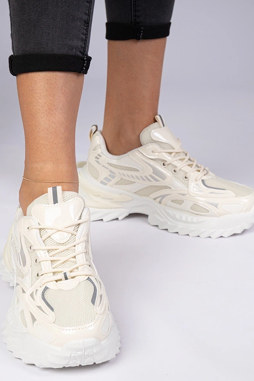 Beige sportliche Sneakers auf...