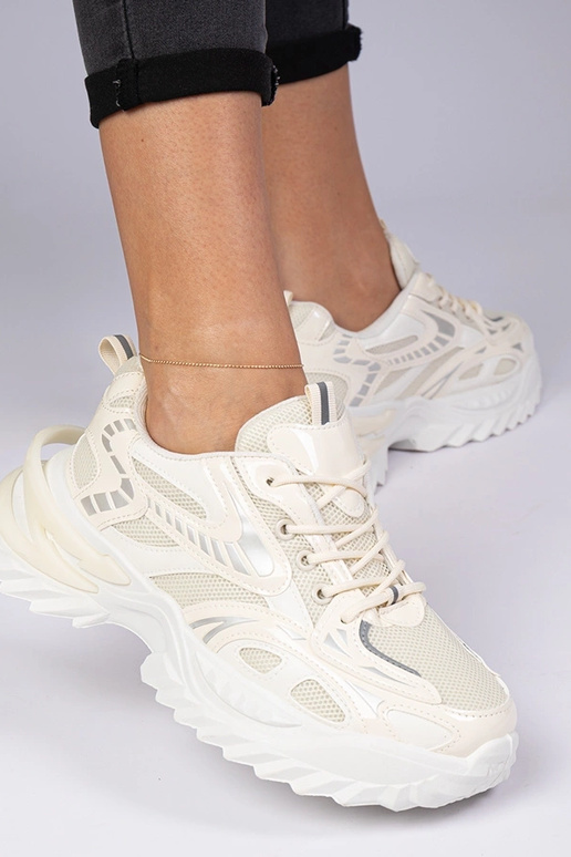 Beige sportliche Sneakers auf...