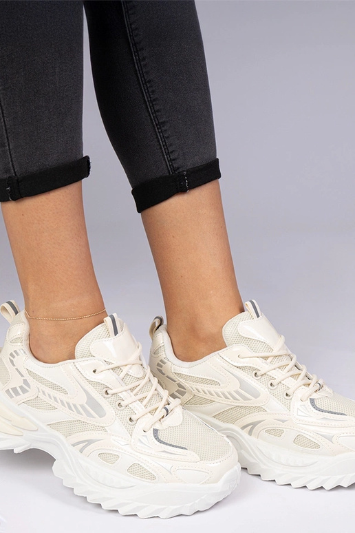 Beige sportliche Sneakers auf...