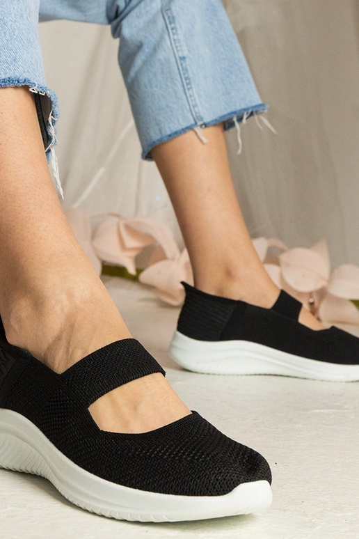 Schwarze Turnschuhe mit geprägter...