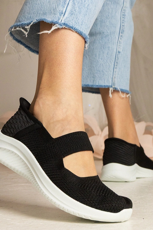 Schwarze Turnschuhe mit geprägter...