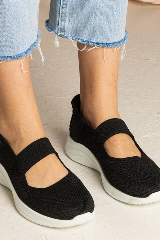 Schwarze Turnschuhe mit geprägter...