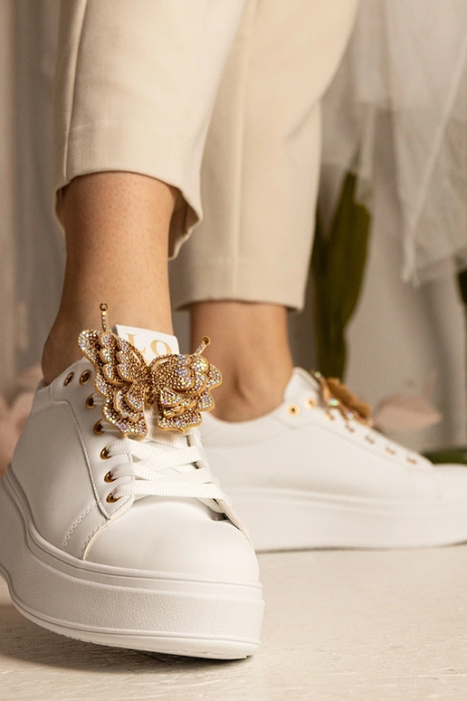 Weiße Sneakers mit Schmetterling und...