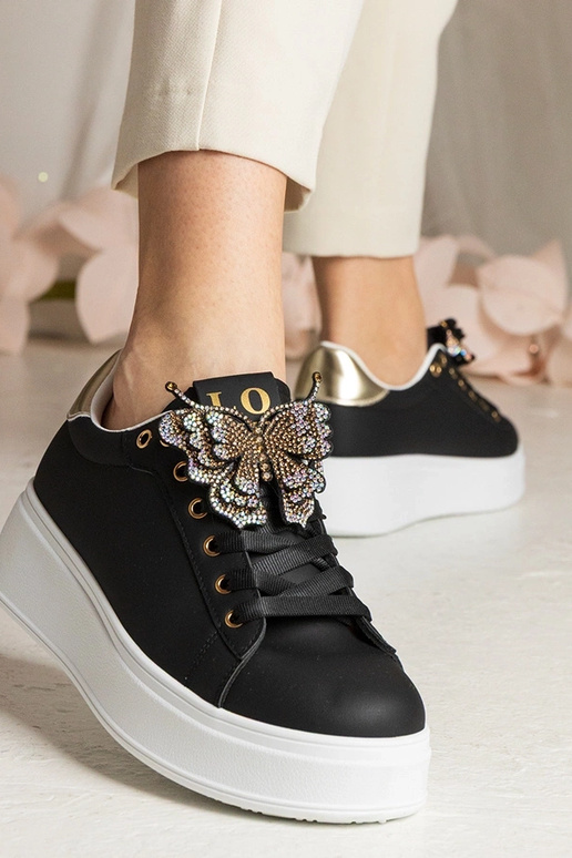 Schwarze Sneakers mit Schmetterling...