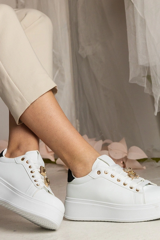 Schwarz-weiße Damen Sneakers mit... Schwarz-weiße Damen Sneakers mit...