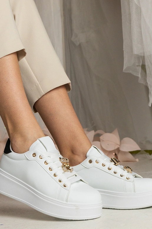 Schwarz-weiße Damen Sneakers mit... Schwarz-weiße Damen Sneakers mit...