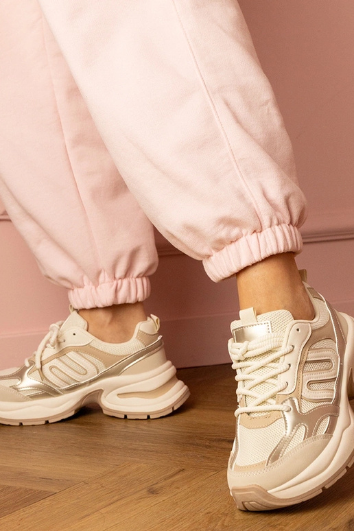 Beige Damen-Sneaker mit dicker... Beige Damen-Sneaker mit dicker...