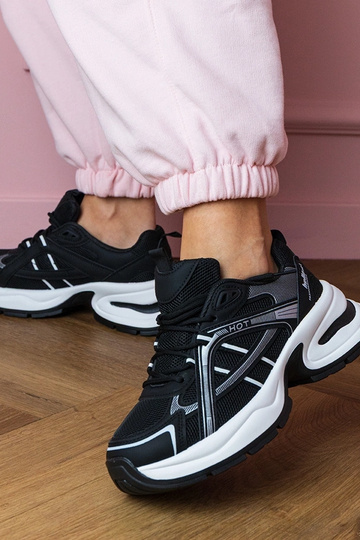 Schwarze Damen-Sneaker auf...