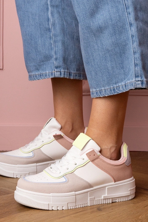 Weiß-graue Damen-Sneaker auf... Weiß-graue Damen-Sneaker auf...