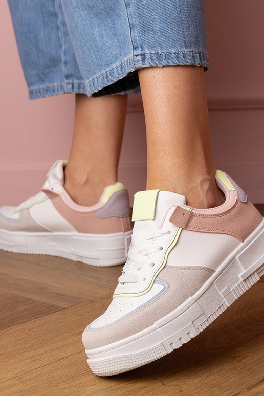 Weiß-graue Damen-Sneaker auf... Weiß-graue Damen-Sneaker auf...