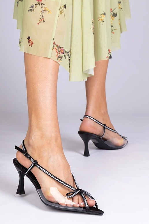 Schwarze transparente Sandalen mit... Schwarze transparente Sandalen mit...