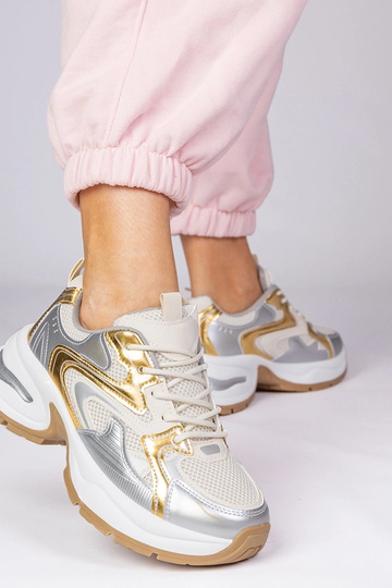 Goldene Sportschuhe mit... 2