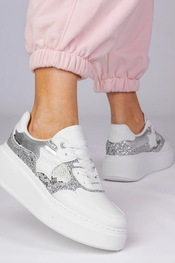 Weiße Sportschuhe mit... 2