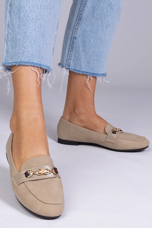 Braune matte Mokassins mit goldenem... Braune matte Mokassins mit goldenem...