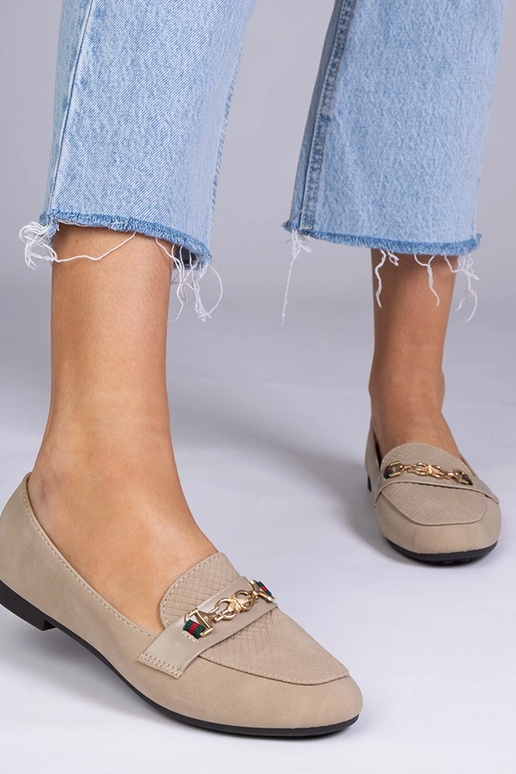 Braune matte Mokassins mit goldenem... Braune matte Mokassins mit goldenem...