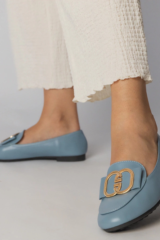 Blaue Damen Mokassins mit goldenem... Blaue Damen Mokassins mit goldenem...