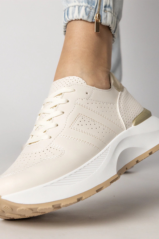 Sandfarbene Sportschuhe mit goldenem...