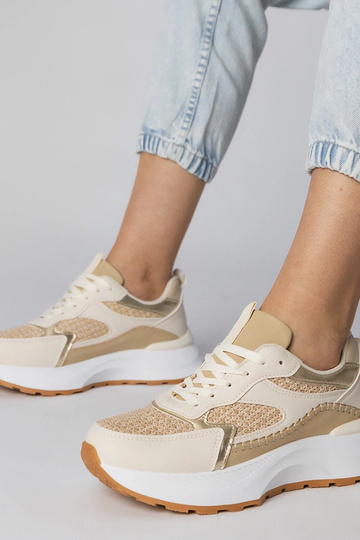 Sandfarbene Sportschuhe mit...