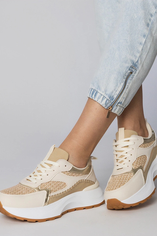 Sandfarbene Sportschuhe mit...