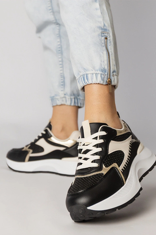 Schwarze Sportschuhe mit geflochtenem...