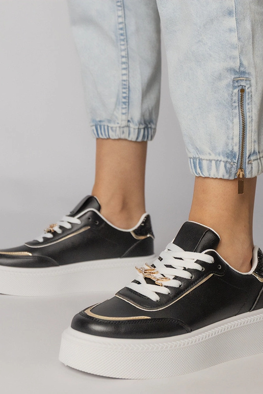 Schwarze Sportschuhe mit Glitzer und...