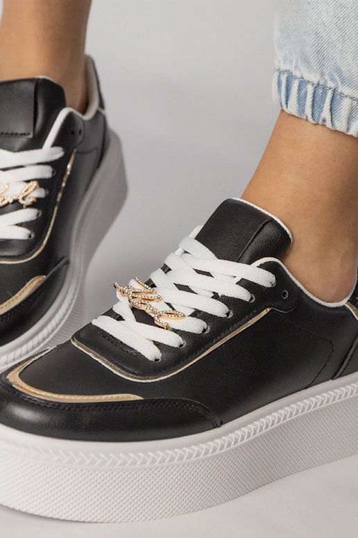 Schwarze Sportschuhe mit Glitzer und...