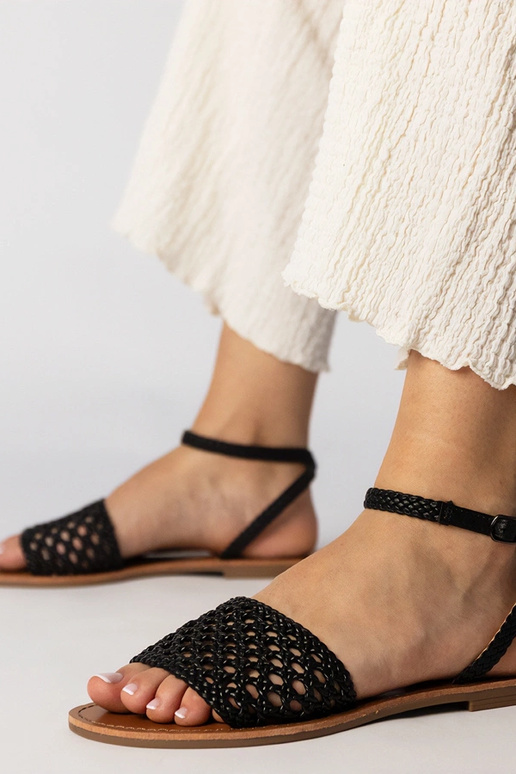 Schwarze geflochtene Sandalen mit...