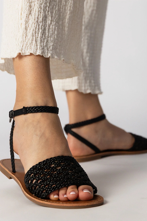 Schwarze geflochtene Sandalen mit...