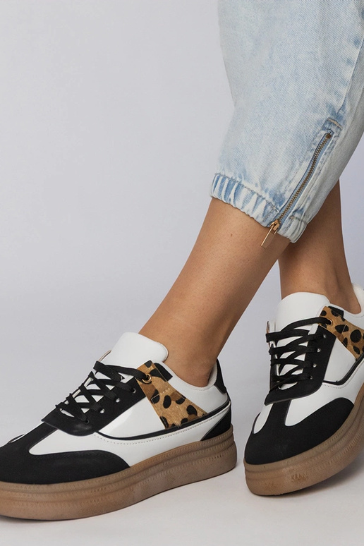 Weiß-schwarze Sneakers mit...